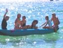 Cruiser Kids in Mexico Playing on SOAR Canoe at Full Moon Party