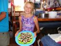 Carolyne displaying her Nori Rolls with fresh Yellowtail