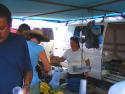 Lori buying provisions from local vendor