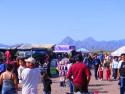 Mountains in background as locals shop for produce