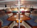 Salon: U-shape settee with queen bed located far aft