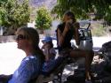 Diane, Maia & Carolyne snacking peacefully under the shade of the mango tree