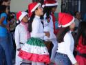 Children celebrating Christmas at the Topo school